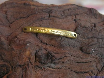 300986853 Live the moment”, goud, 43x5mm”